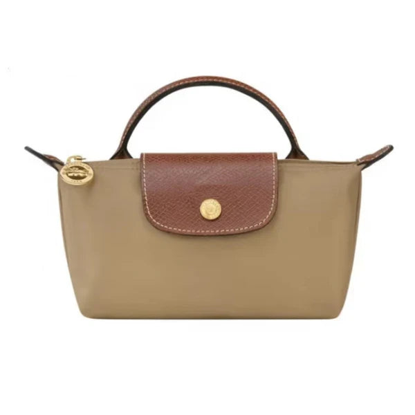 https://cdn.shopify.com/s/files/1/0890/4156/8032/files/Desert_Yellow_Longchamp_787c7ae9-eb99-47f2-808c-2f41e010e817.webp?v=1738316274