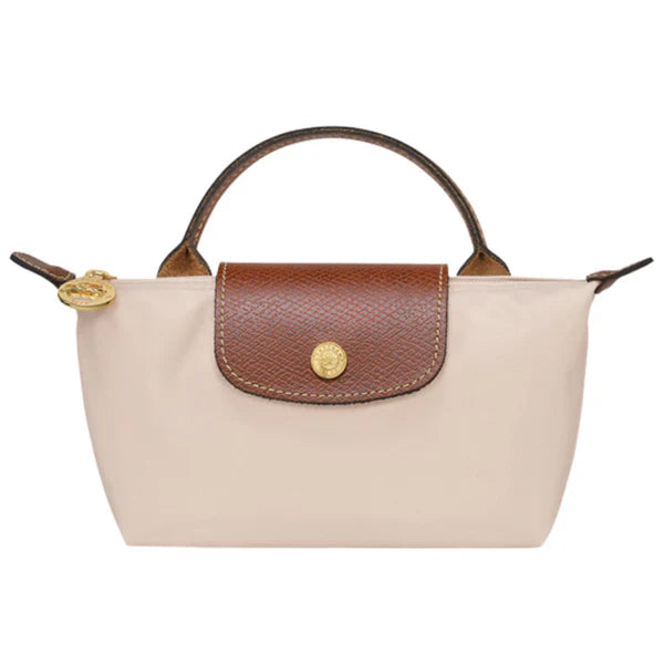 https://cdn.shopify.com/s/files/1/0890/4156/8032/files/White_Longchamp_4d37ec26-7135-4275-a0d8-92fe95dbd44d.webp?v=1738316274